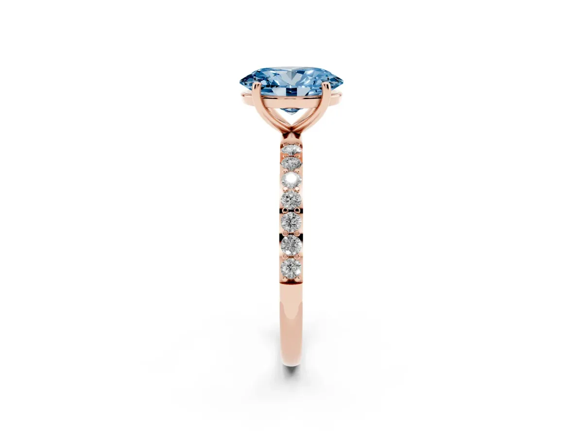 Fancy Blue Oval Cut Diamond Solitaire Ring with Round Pavé Shoulders and Prong Setting Rose gold