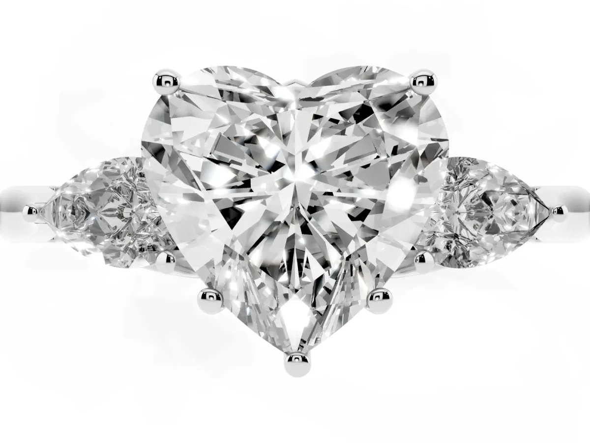 Three-Stone Heart Cut Diamond Ring with Pear Side Stones in Four-Prong Setting Silver
