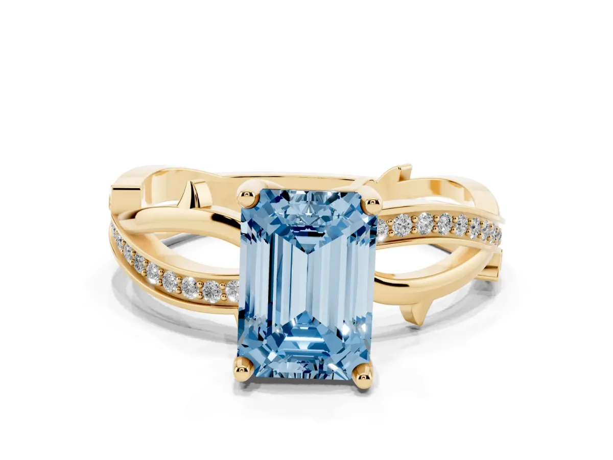 Fancy Blue Emerald Cut Solitaire Twist Band with Pavé Accents and Four-Prong Setting Yellow gold