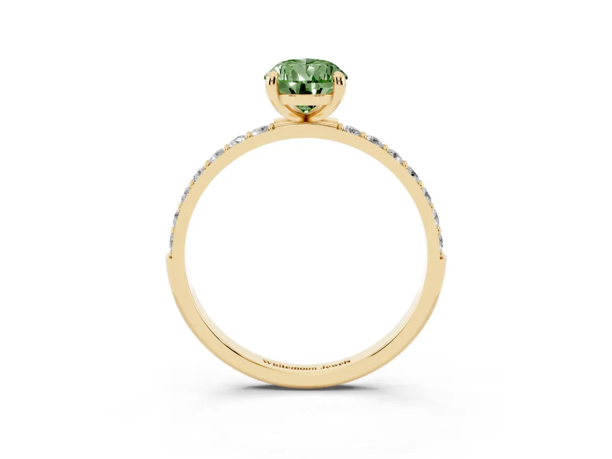 Fancy Green Pear Cut Diamond Solitaire Ring with Round Pavé Band and Prong Setting Yellow gold
