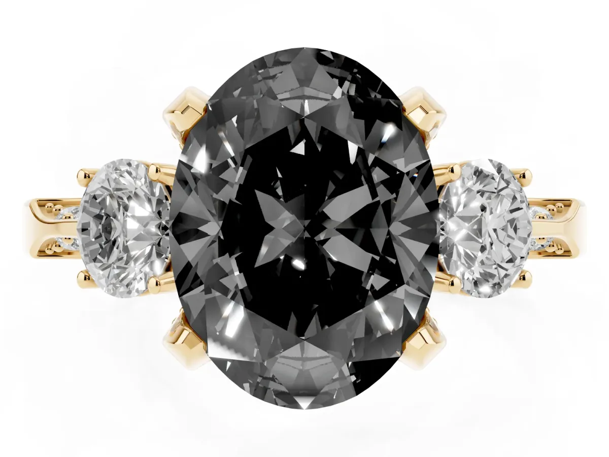 Fancy Black Oval Cut Brilliant Three-Stone Diamond Ring with Pavé Band and Four-Prong Setting Yellow gold
