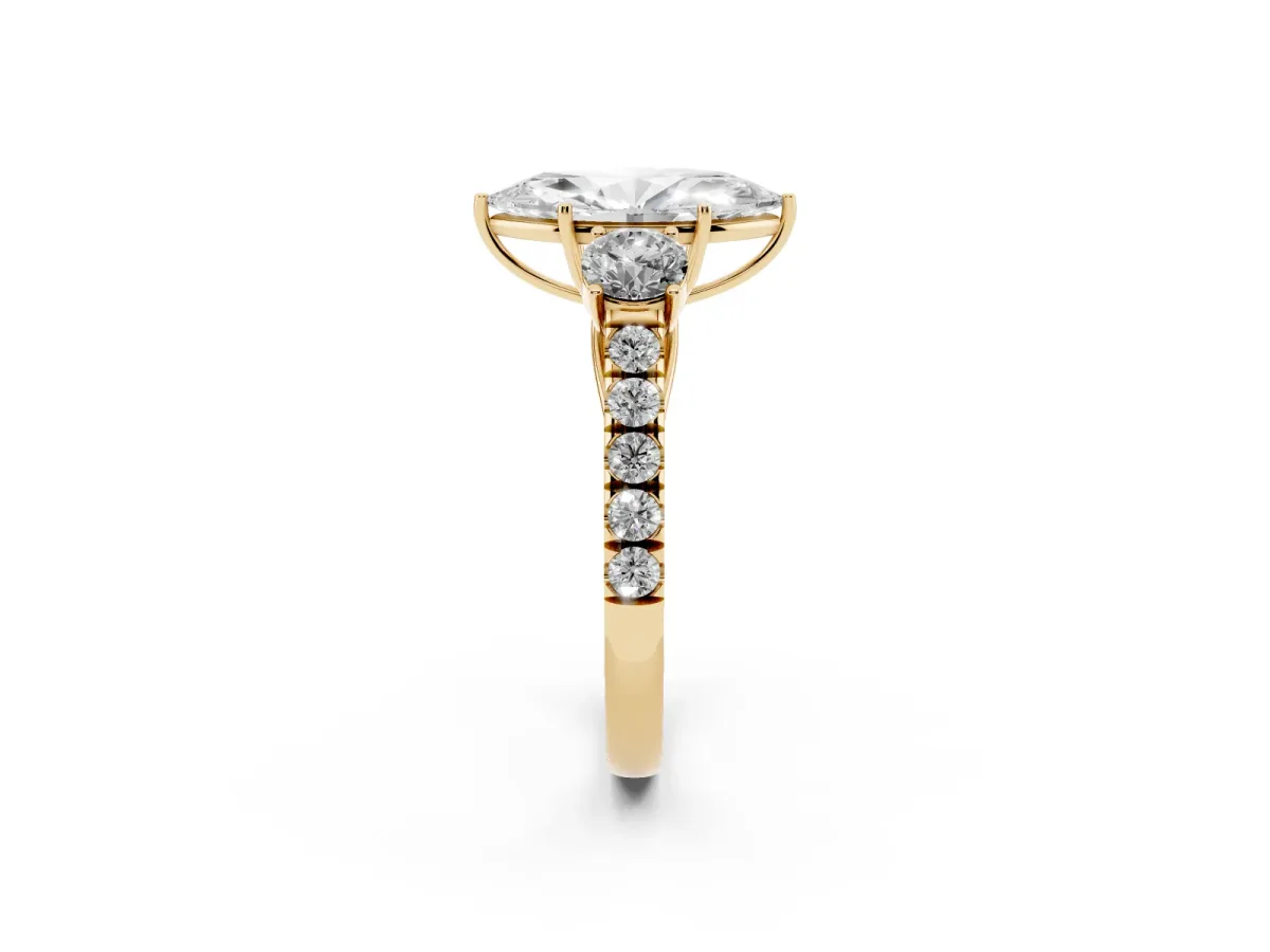 Marquise Cut Cut Diamond Three-Stone Ring with Round Side Stones and Pavé Band Yellow gold