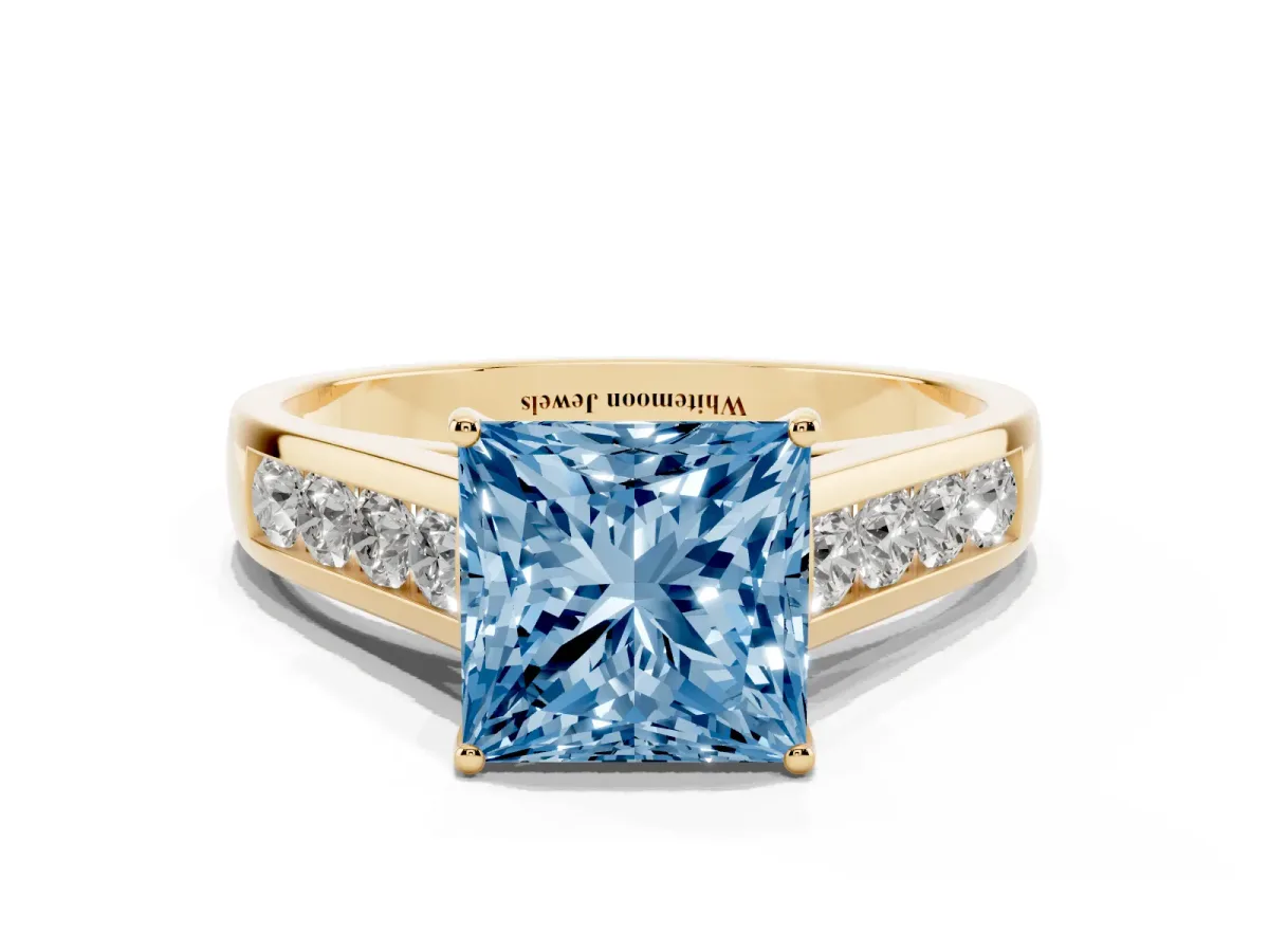 Fancy Blue Princess Cut Brilliant Channel-Set Solitaire Ring with Four-Prong Setting Yellow gold