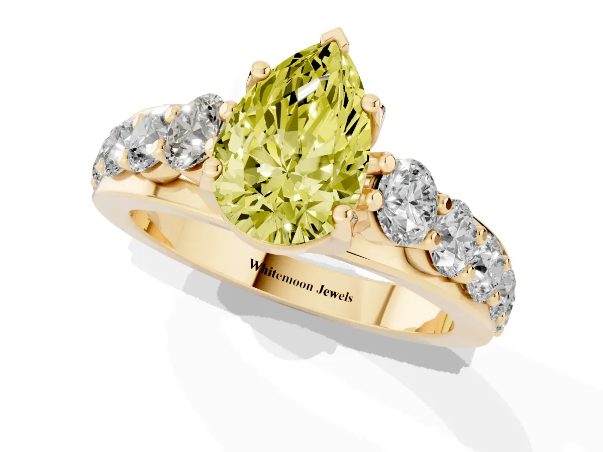 Fancy Yellow Pear Cut Diamond Engagement Ring with Pavé Band and Four-Prong Setting Yellow gold