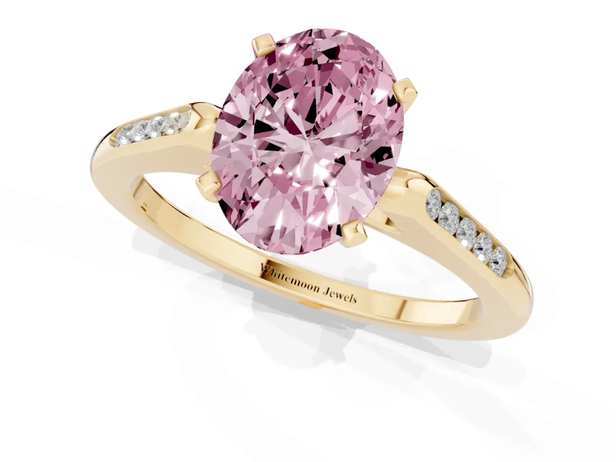 Fancy Pink Oval Cut Diamond Solitaire Ring with Channel Set Round Band and Prong Setting Yellow gold