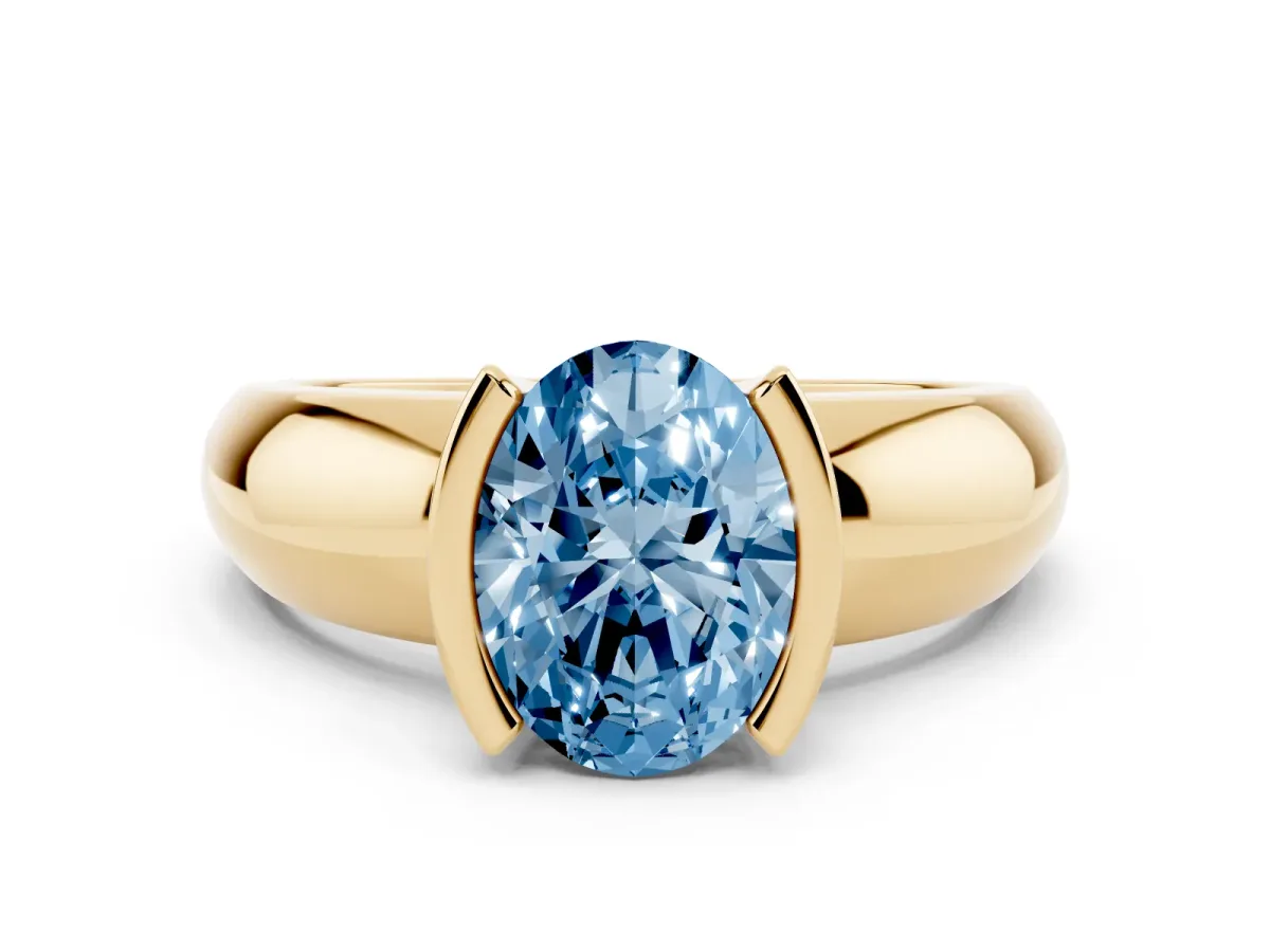 Fancy Blue Oval Cut Solitaire Tension Set Diamond Ring with Wide Band Yellow gold