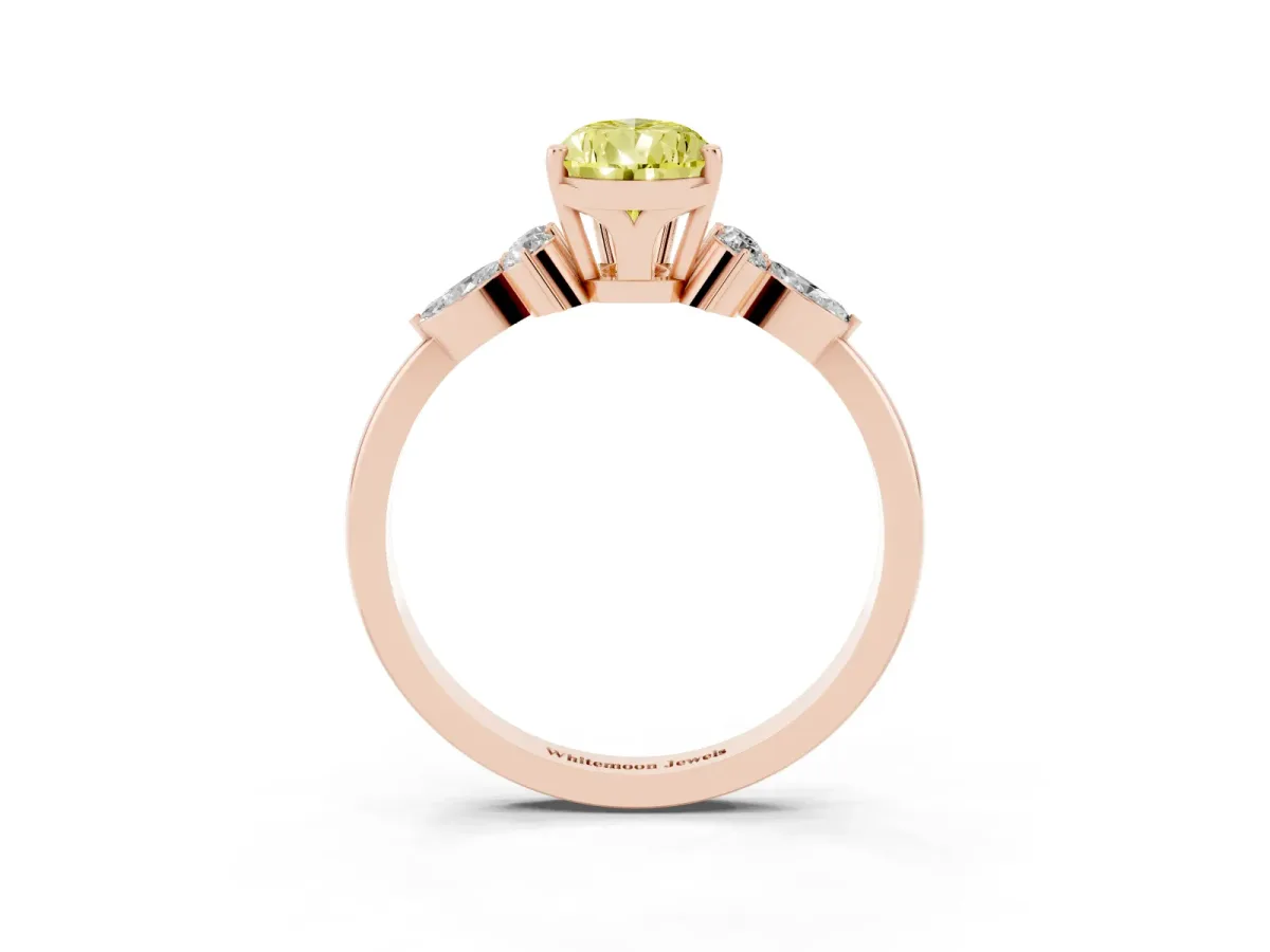 Fancy Yellow Pear Cut Brilliant Diamond Solitaire Ring with Pear Side Stones and Four-Prong Setting Rose gold