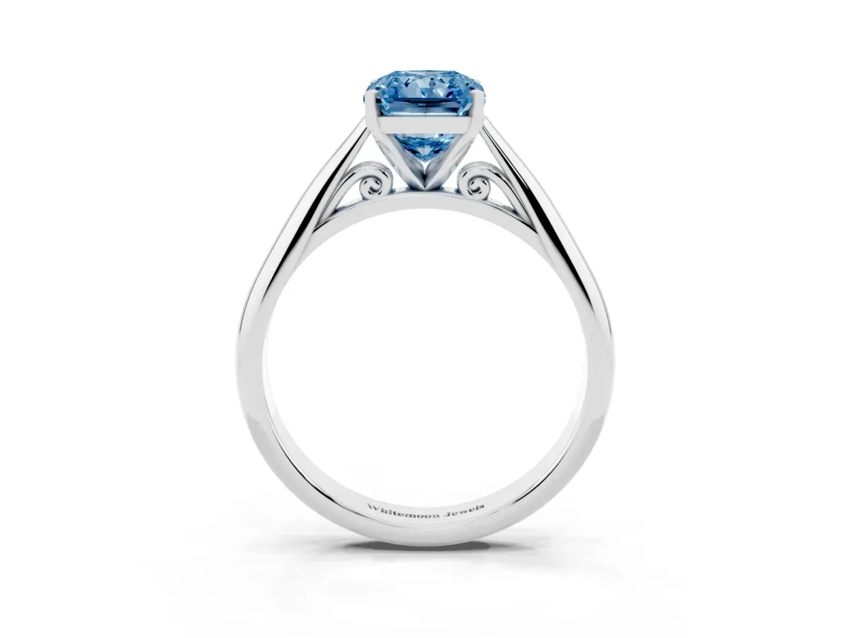 Fancy Blue Radiant Cut Diamond Solitaire Engagement Ring with Cathedral Setting and Four-Prong Mount Silver