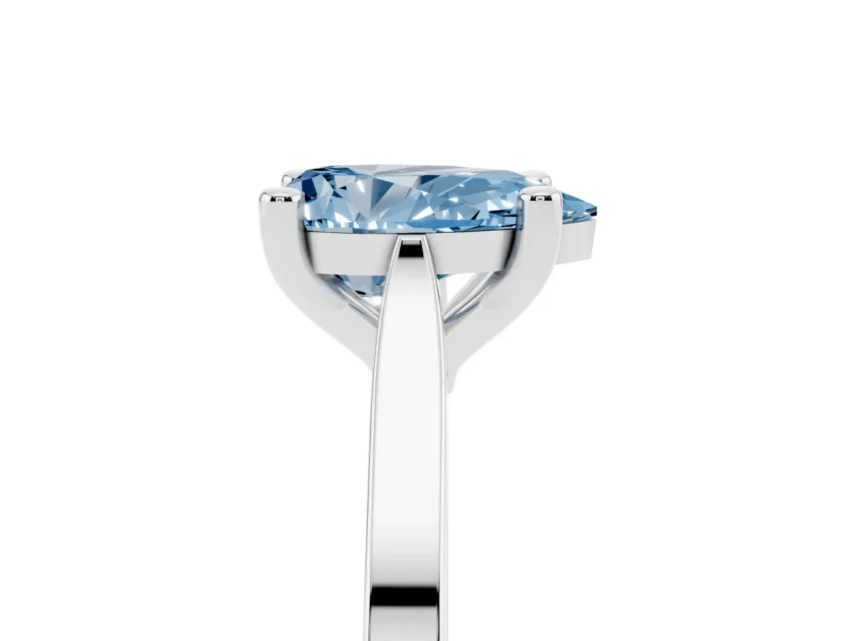 Fancy Blue Pear Cut Solitaire Diamond Ring with Four-Prong Setting and Tapered Band Platinum