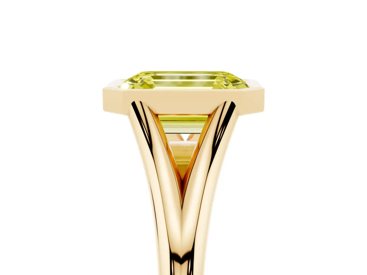 Fancy Yellow Bezel Set Emerald Cut Cut Solitaire Ring with Tapered Band Yellow gold