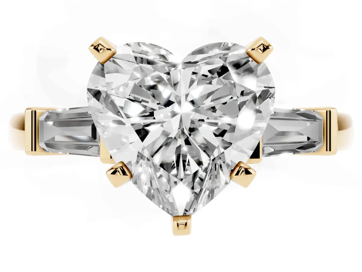 Heart Cut Cut Diamond Solitaire Ring with Tapered Baguette Accents and Four-Prong Setting Yellow gold