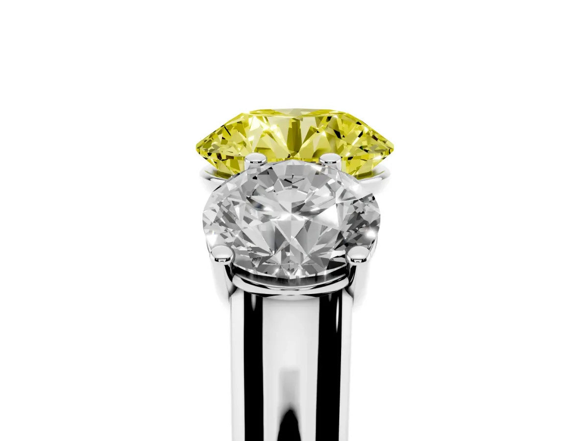 Fancy Yellow Round Cut Three-Stone Diamond Ring with Prong Setting on a Classic Band Silver