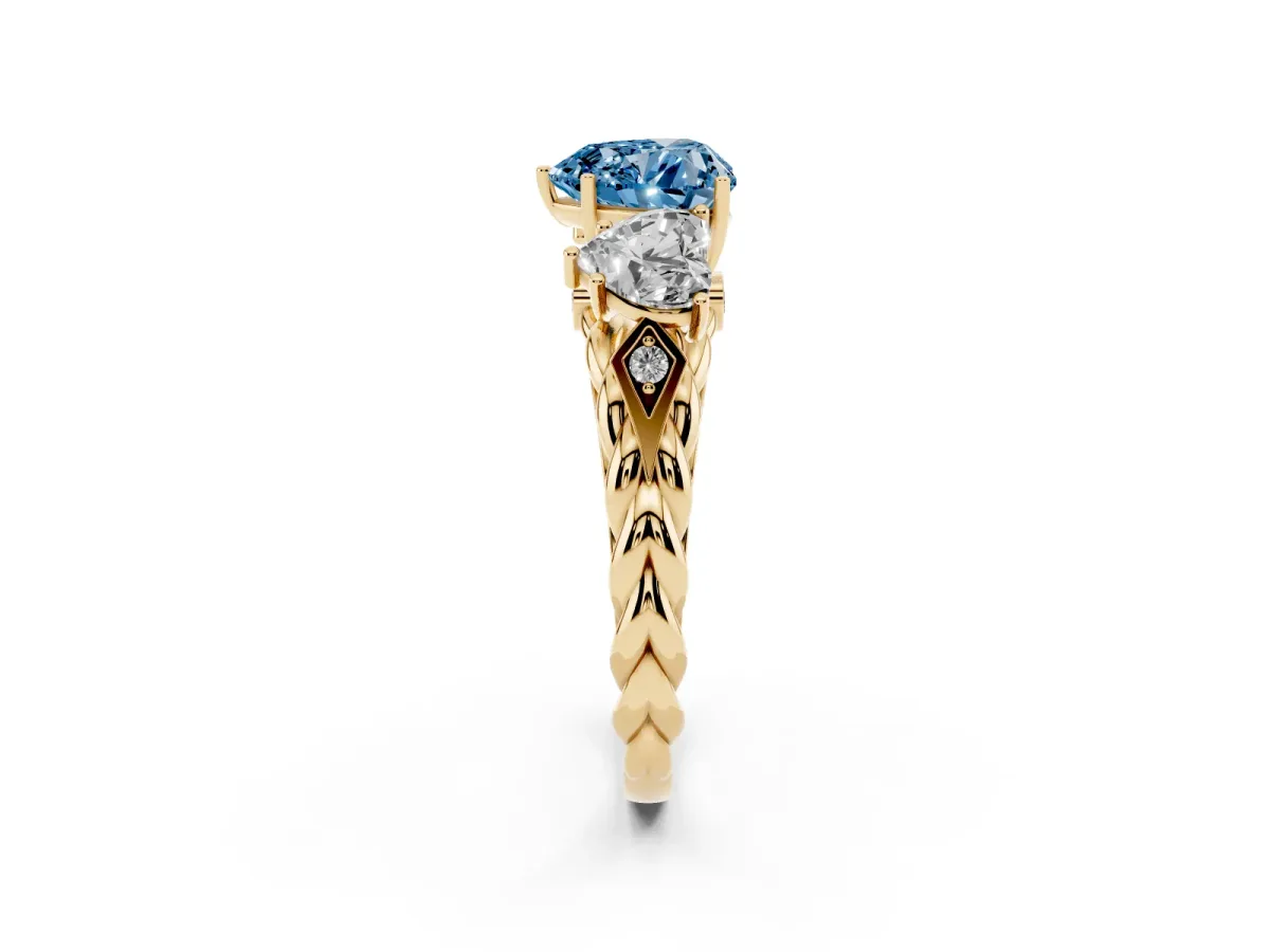 Fancy Blue Three-Stone Heart Cut Diamond Braided Band Ring with Four-Prong Setting Yellow gold