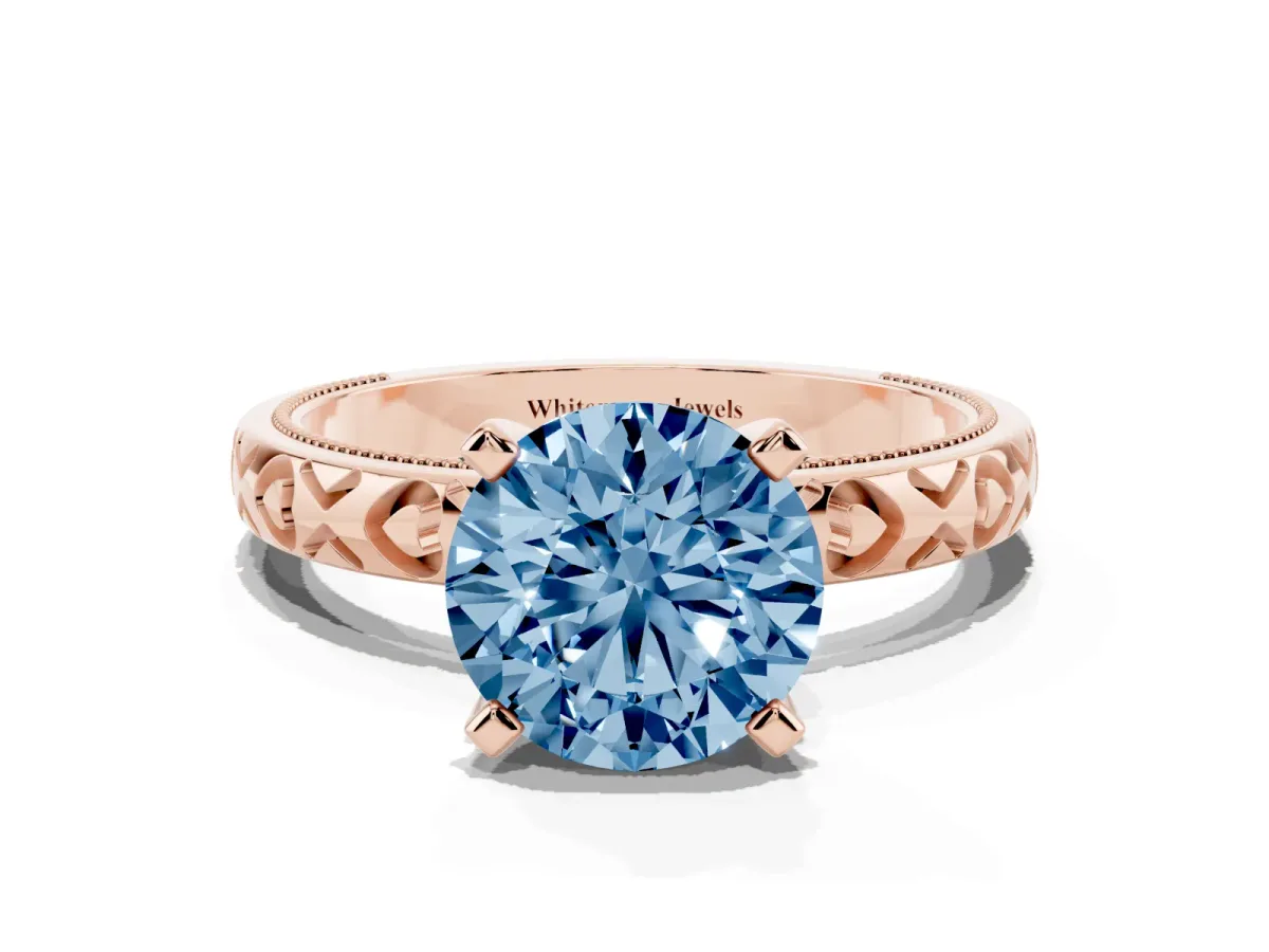 Fancy Blue Round Cut Solitaire Diamond Engagement Ring with XO Engraved Band and Four-Prong Setting Rose gold