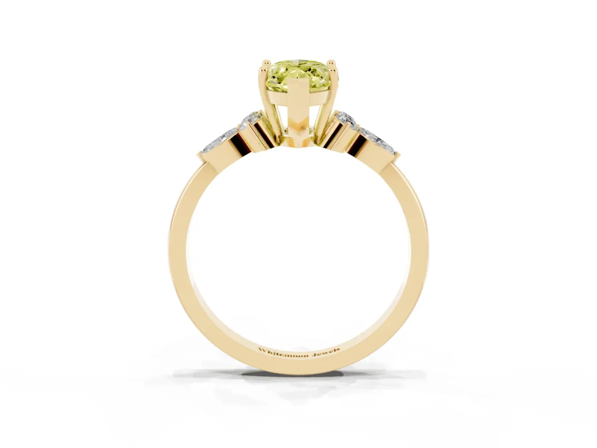 Fancy Yellow Marquise Cut Brilliant Diamond Solitaire Ring with Pear Side Stones and Four-Prong Setting Yellow gold