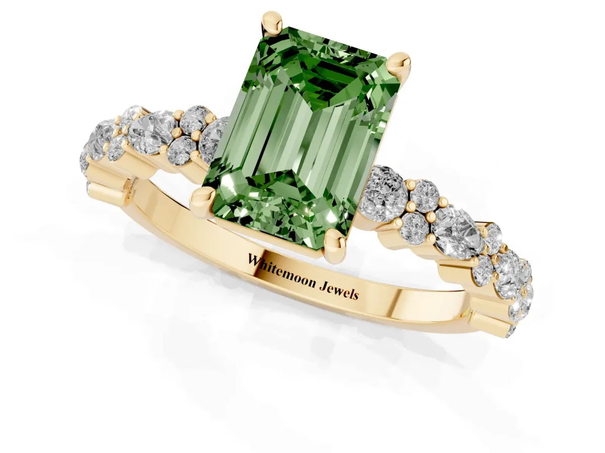 Fancy Green Emerald Cut Diamond Side Stone Solitaire Ring with Round and Four-Prong Setting Yellow gold