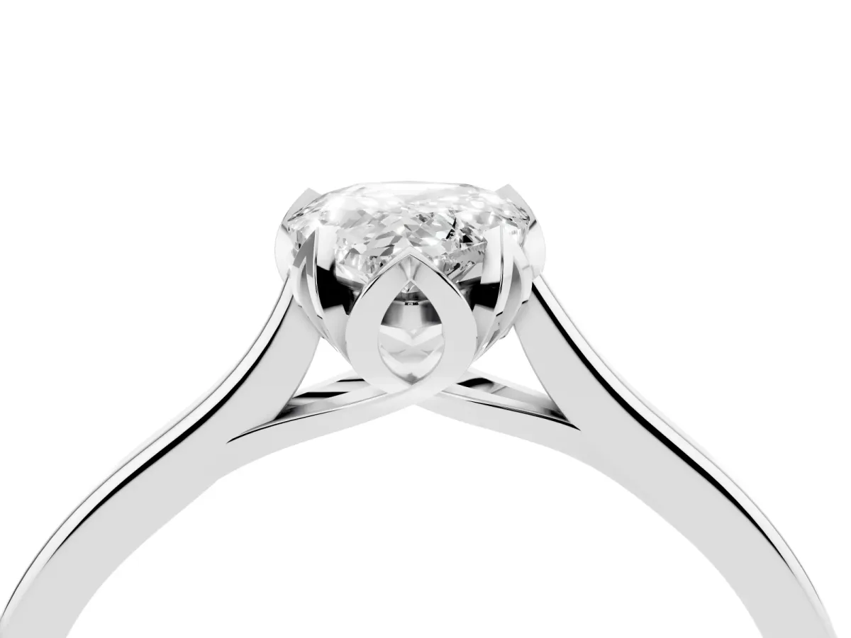 Pear Cut Diamond Solitaire Ring with Flower Prong Setting and Classic Band Silver