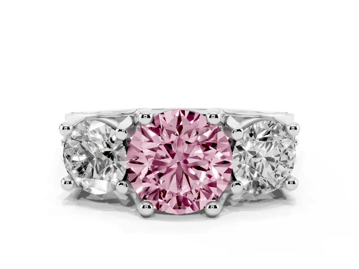 Fancy Pink Round Cut Diamond Three-Stone Ring with Channel Set Band and Four-Prong Setting Silver
