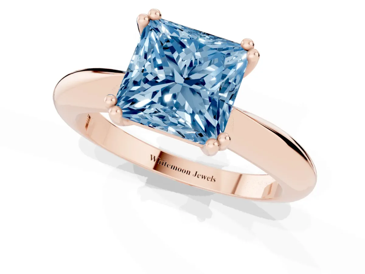 Fancy Blue Princess Cut Cut Solitaire Engagement Ring with Tapered Band and Four-Prong Setting Rose gold