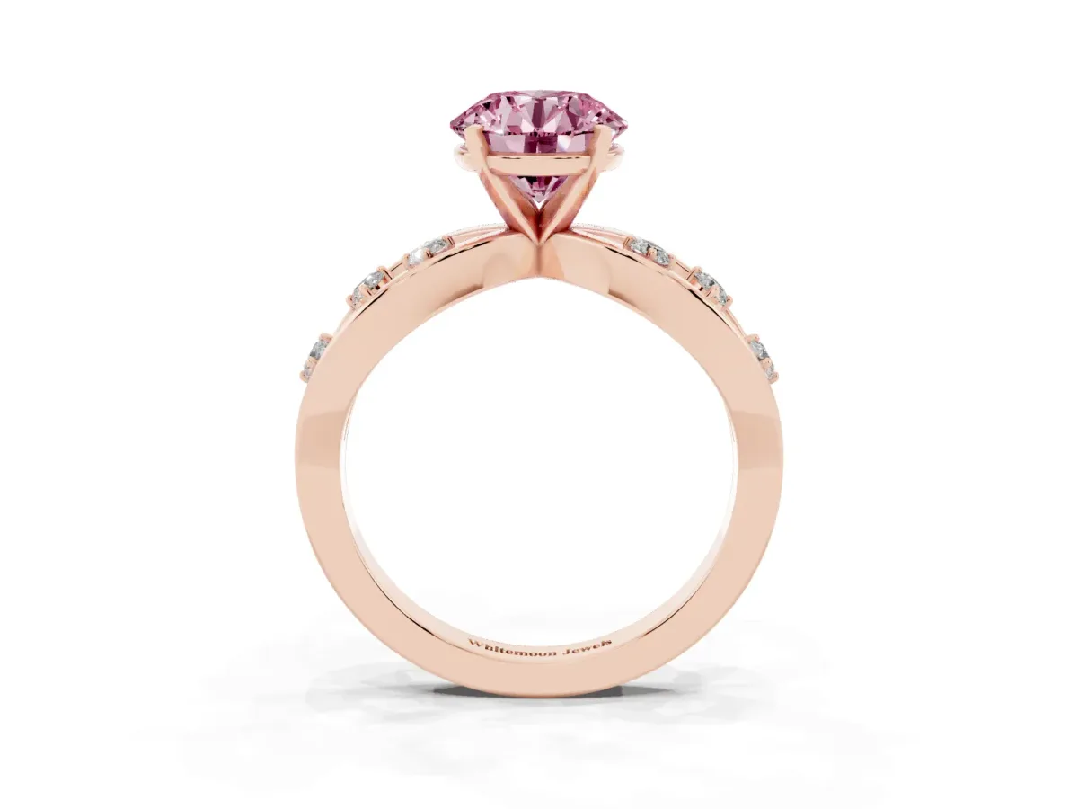 Fancy Pink Round Cut Cut Solitaire Diamond with Side Stones on Criss-Cross Band and Four-Prong Setting Rose gold