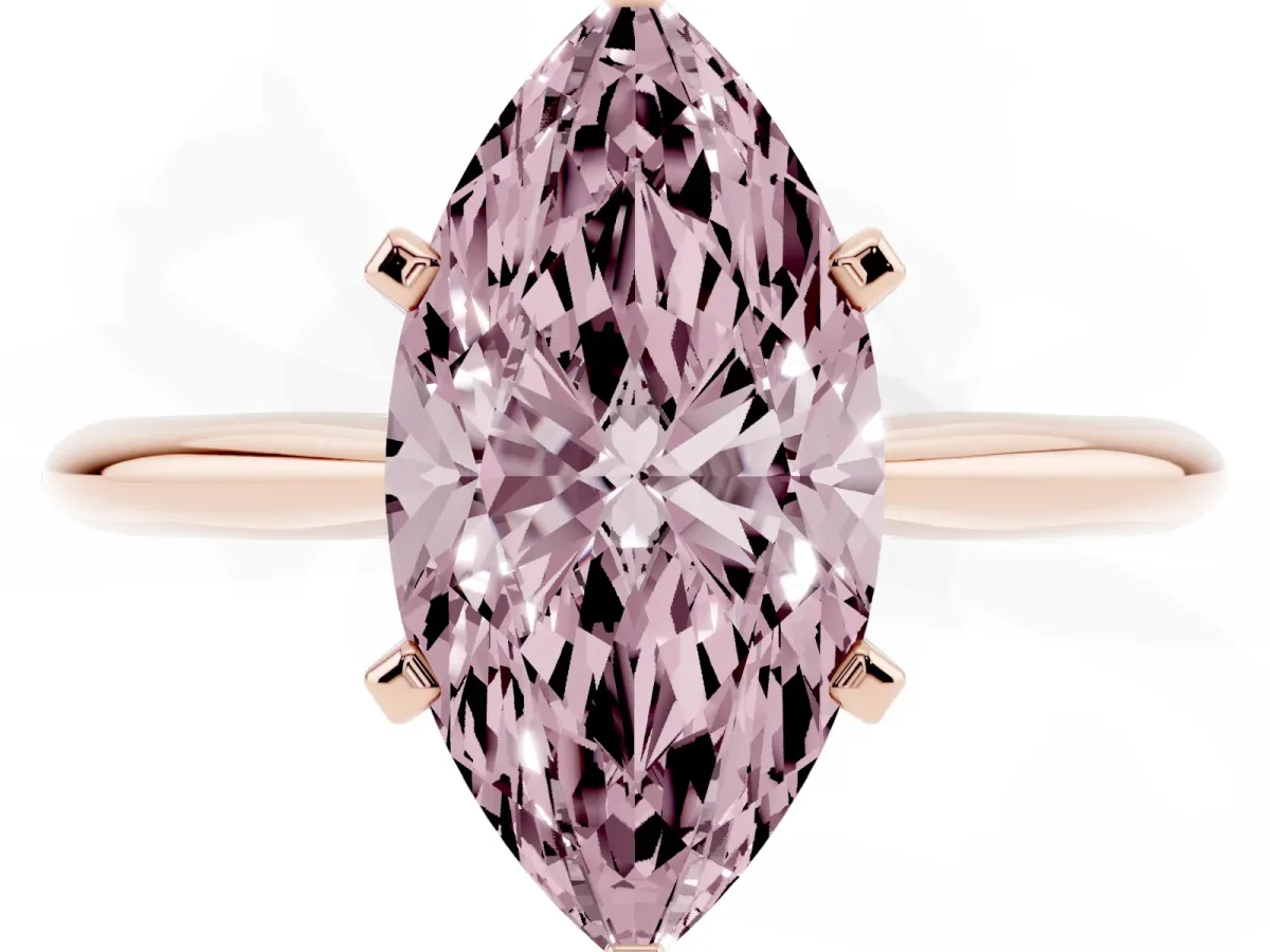 Fancy Pink Marquise Cut Cut Solitaire Ring with Four-Prong Setting on a Classic Band Rose gold