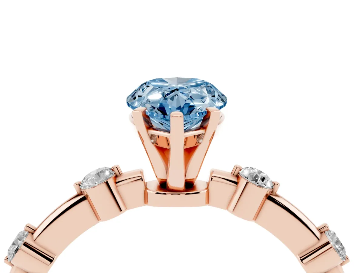 Fancy Blue Pear Cut Solitaire Diamond Ring with Bezel Set Side Stones and Prong Setting Rose gold