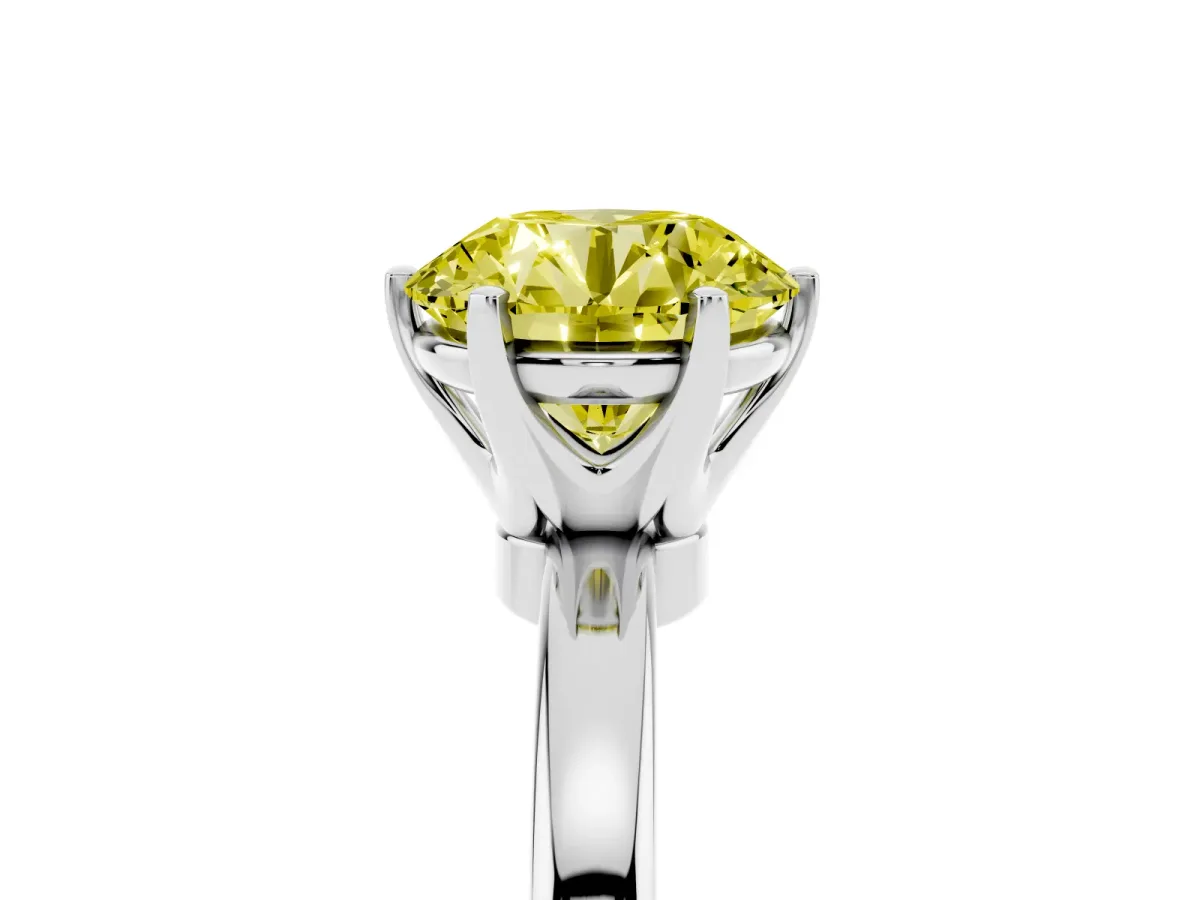 Fancy Yellow Round Cut Solitaire Diamond Ring with Six-Prong Setting on a Classic Band Silver