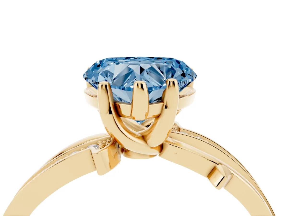 Fancy Blue Heart Cut Solitaire Twist Band with Pavé Accents and Four-Prong Setting Yellow gold