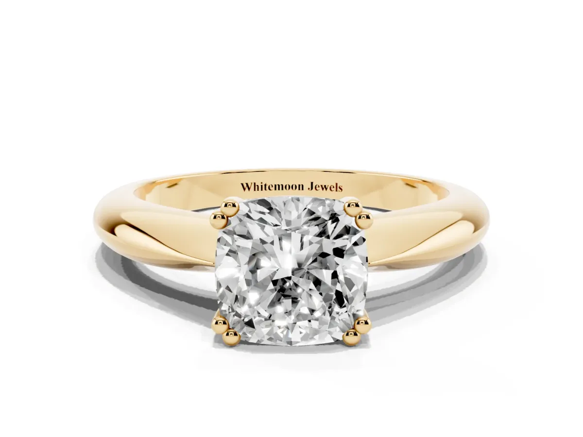 Cushion Cut Cut Solitaire Engagement Ring with Tapered Band and Four-Prong Setting Yellow gold