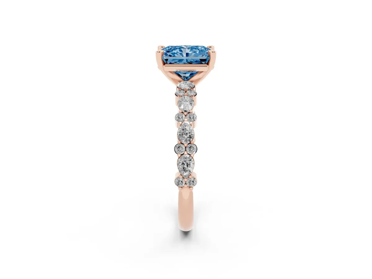 Fancy Blue Radiant Cut Diamond Side Stone Solitaire Ring with Round and Four-Prong Setting Rose gold