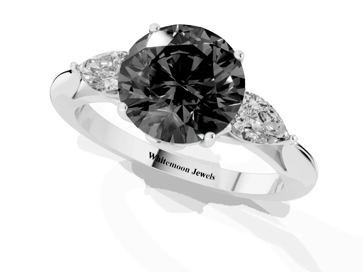 Fancy Black Round Cut Diamond Three-Stone Ring with Pear Side Stones and Prong Setting Platinum