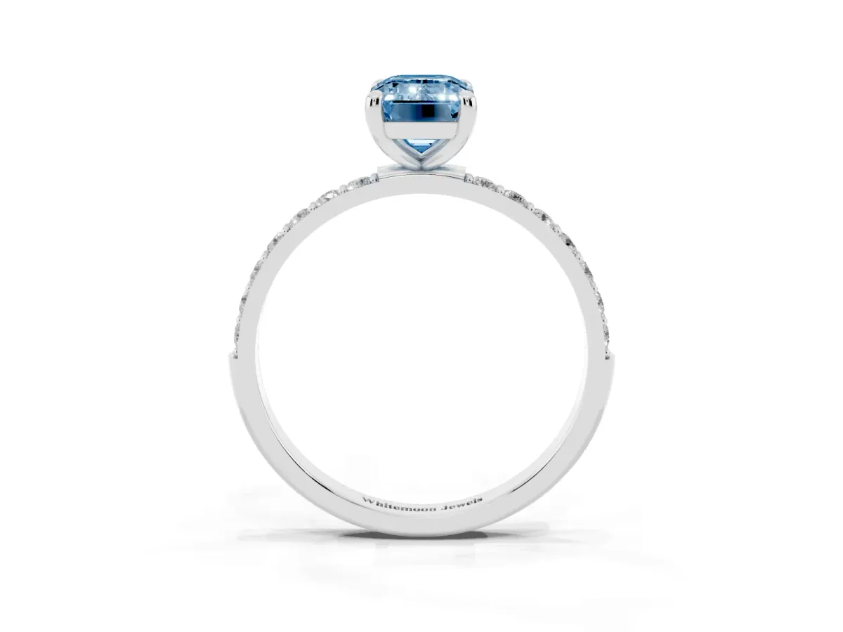 Fancy Blue Emerald Cut Diamond Solitaire Ring with Round Pavé Band and Prong Setting Silver