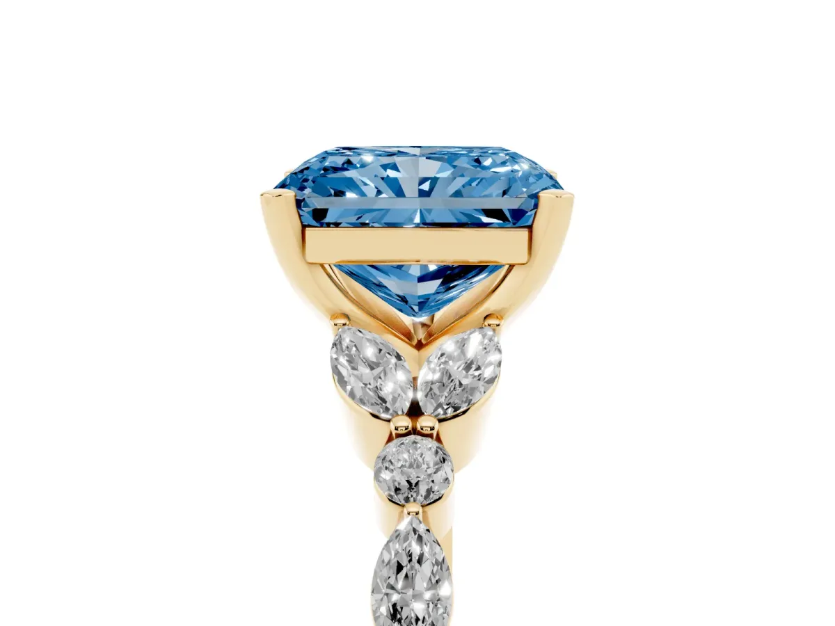 Fancy Blue Radiant Cut Diamond Solitaire Ring with Side Stones and Four-Prong Setting Yellow gold