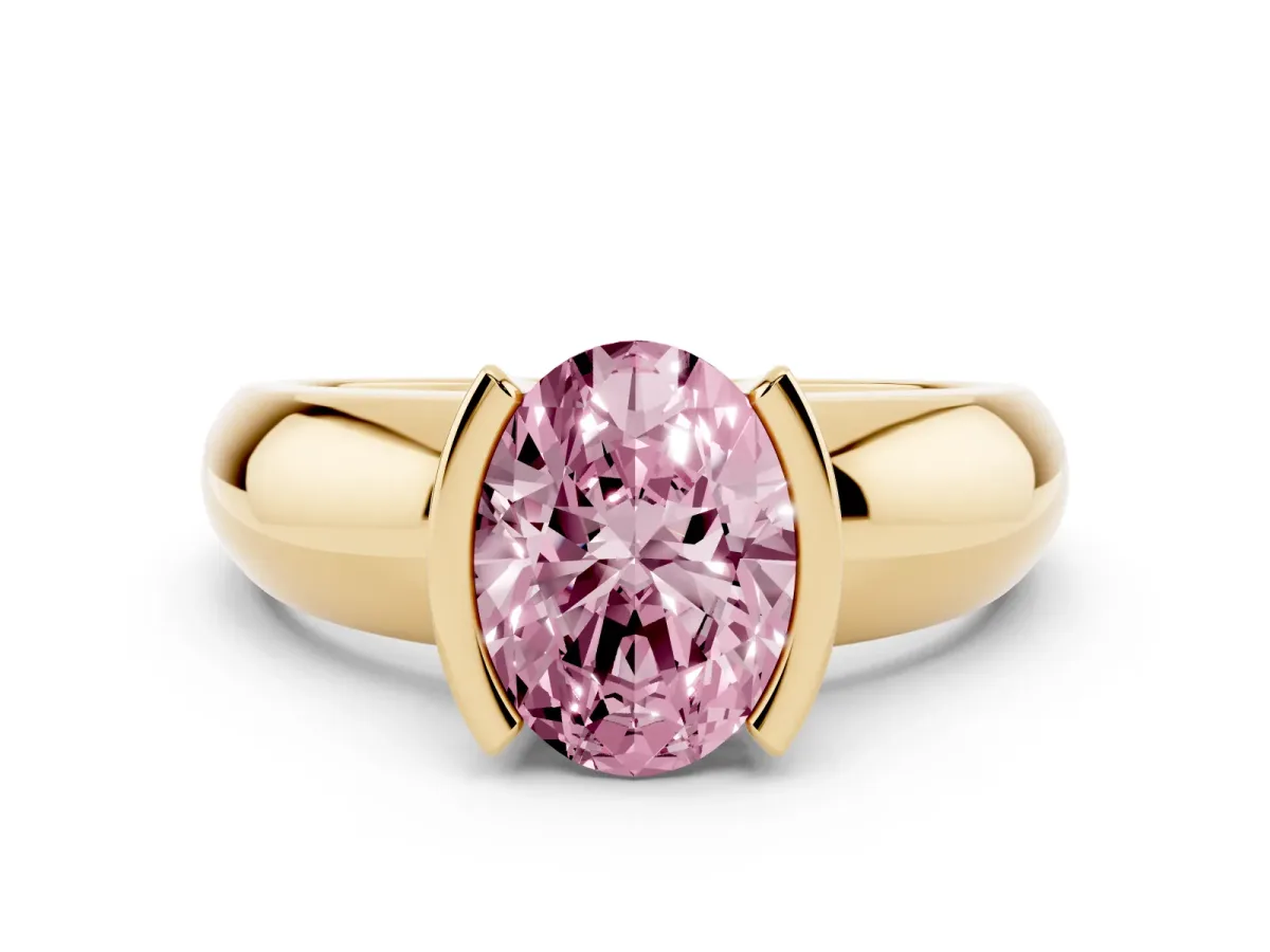Fancy Pink Oval Cut Solitaire Tension Set Diamond Ring with Wide Band Yellow gold