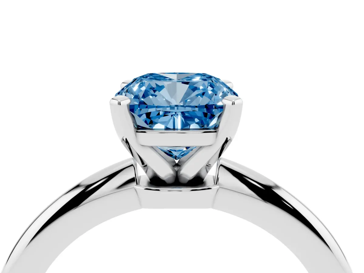 Fancy Blue Cushion Cut Diamond Solitaire Ring with Prong Setting and Classic Band Silver