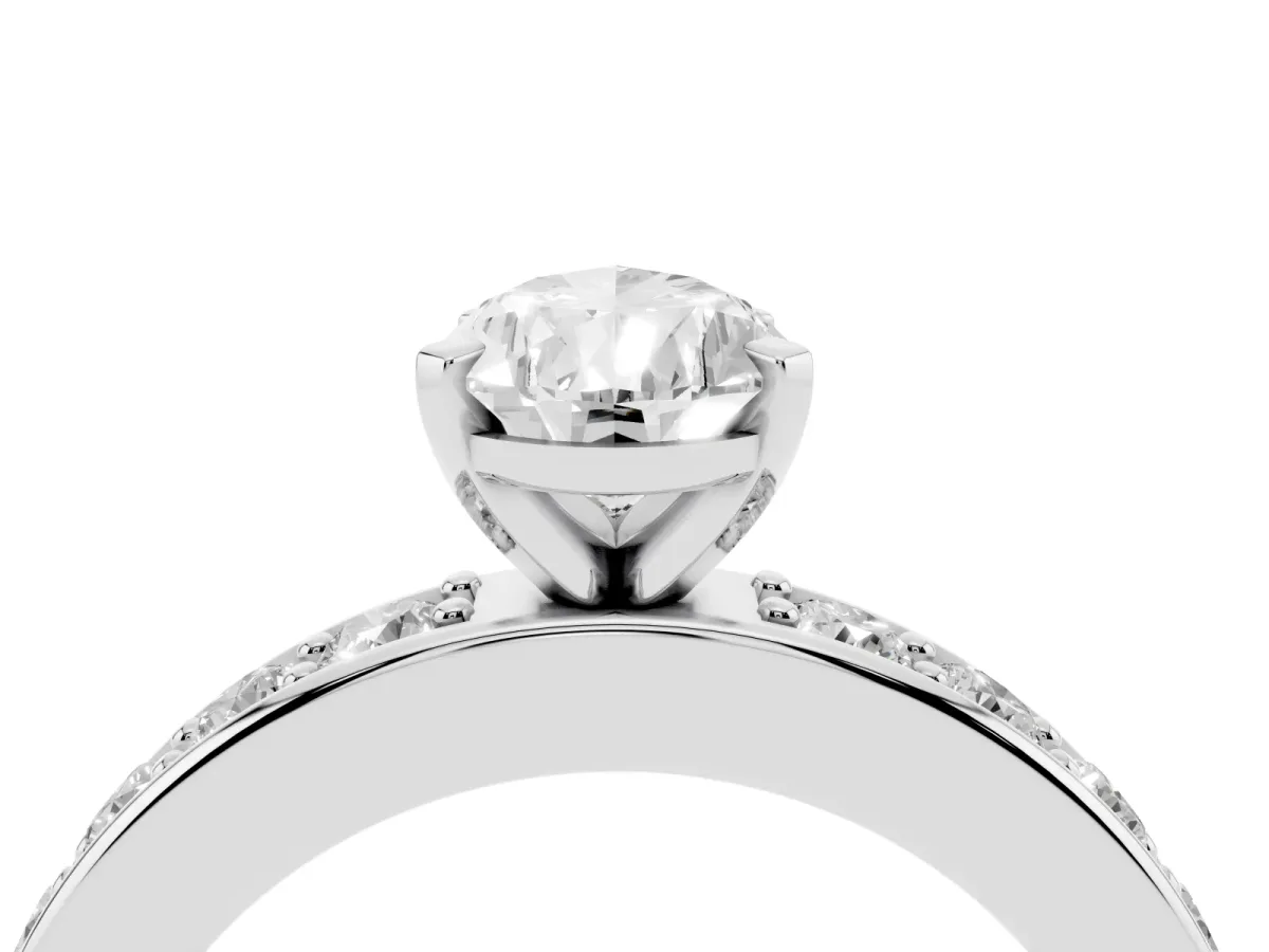 Pear Cut Diamond Engagement Ring with Channel Set Round Band and Prong Setting Silver