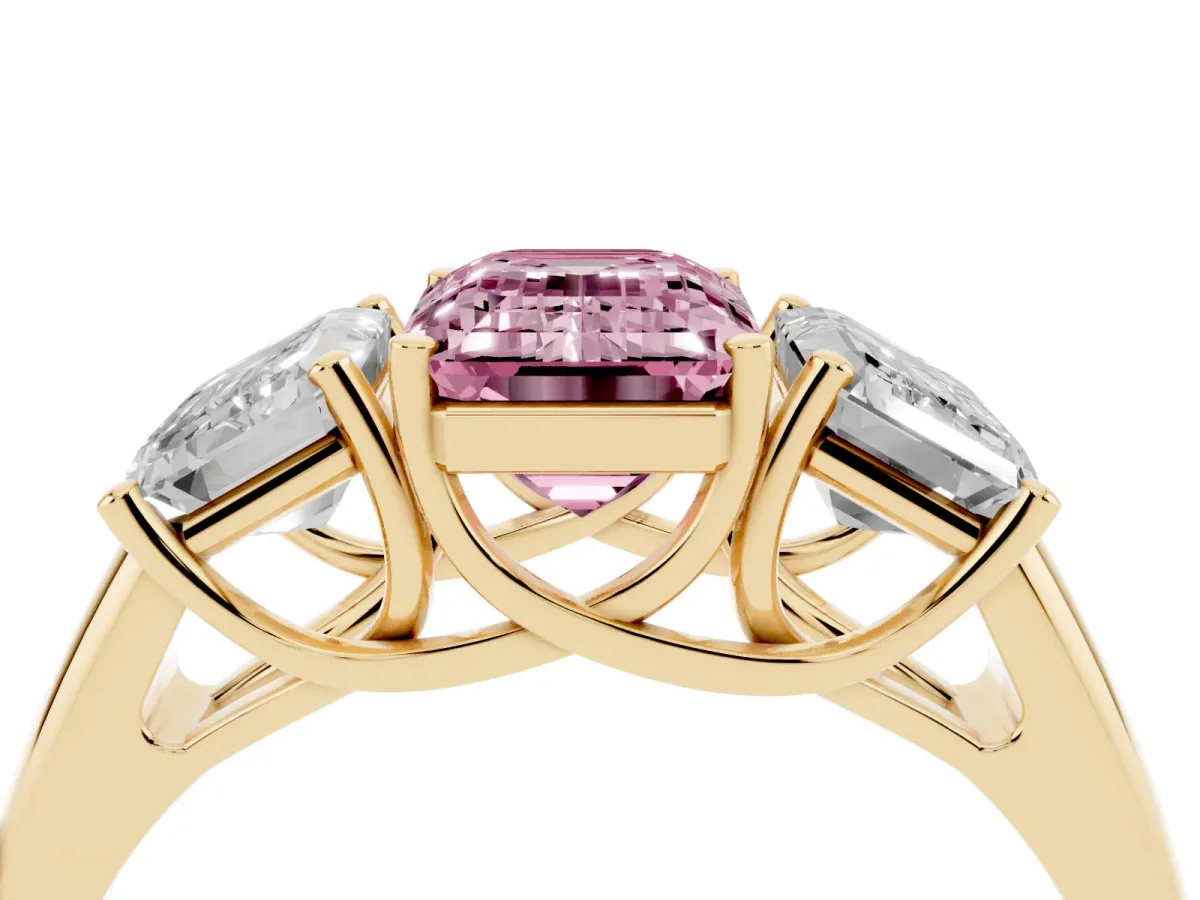 Fancy Pink Three-Stone Emerald Cut Diamond Engagement Ring with Prong Setting Yellow gold