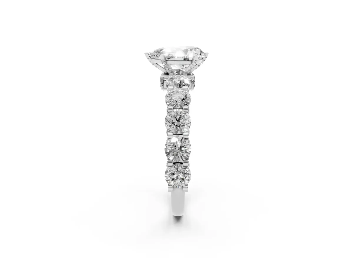 Pear Cut Diamond Side Stone Engagement Ring with Four-Prong Setting Silver
