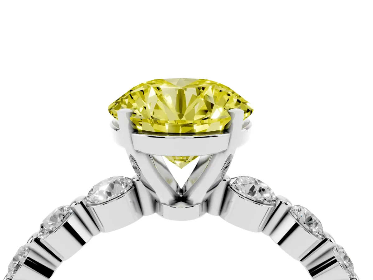 Fancy Yellow Round Cut Solitaire Diamond Ring with Pave Band and Four-Prong Setting Silver