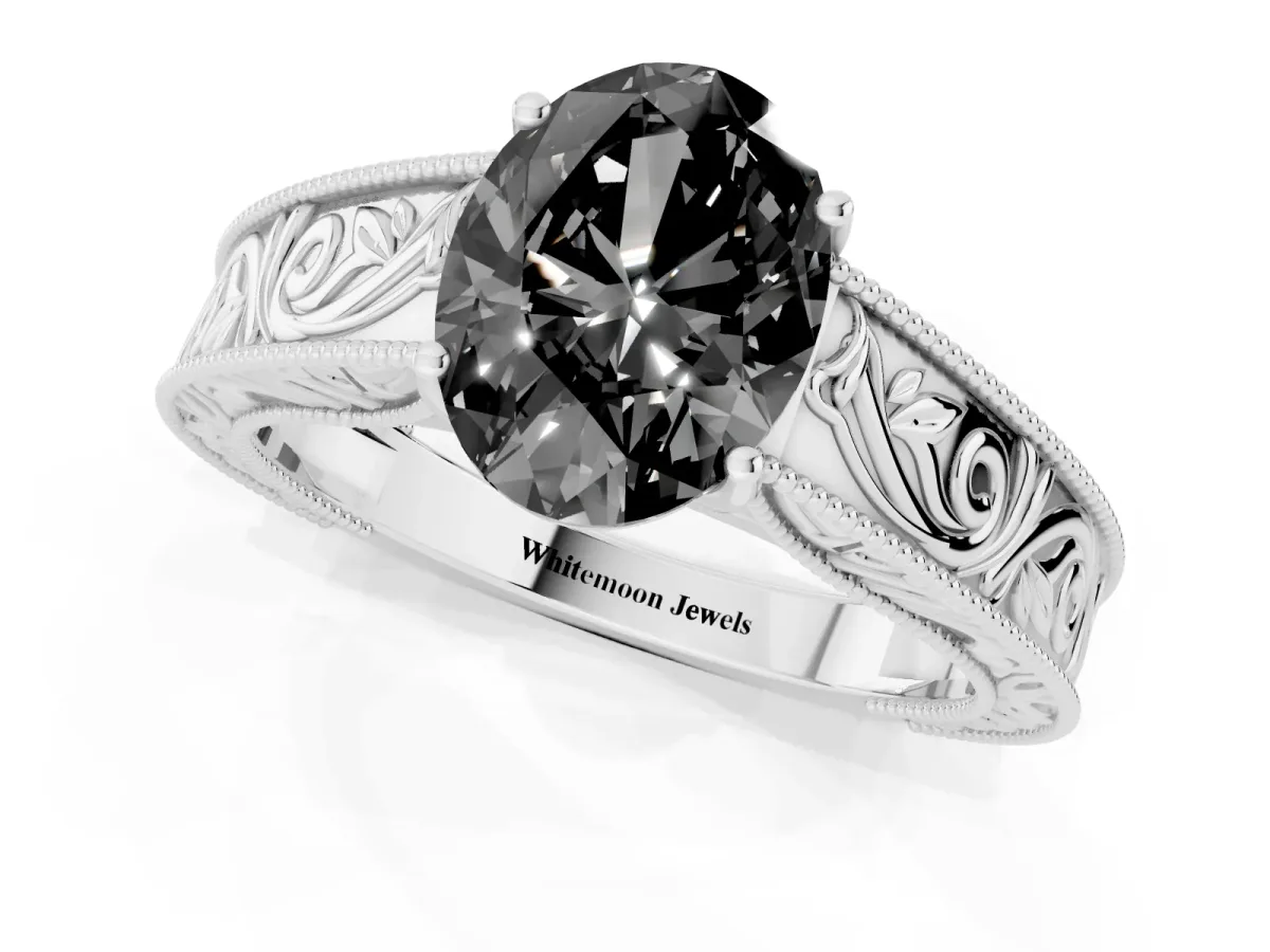Fancy Black Oval Cut Diamond Solitaire Ring with Engraved Band and Four-Prong Setting Platinum