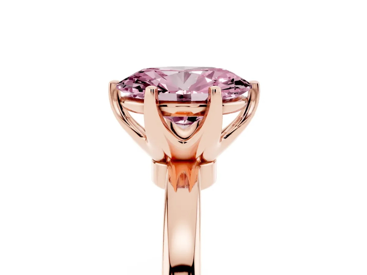 Fancy Pink Oval Cut Solitaire Diamond Ring with Six-Prong Setting on a Classic Band Rose gold