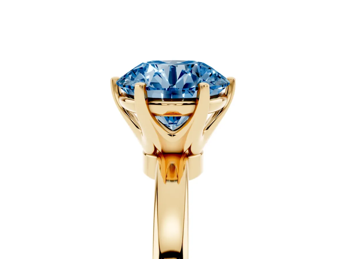 Fancy Blue Round Cut Solitaire Diamond Ring with Six-Prong Setting on a Classic Band Yellow gold