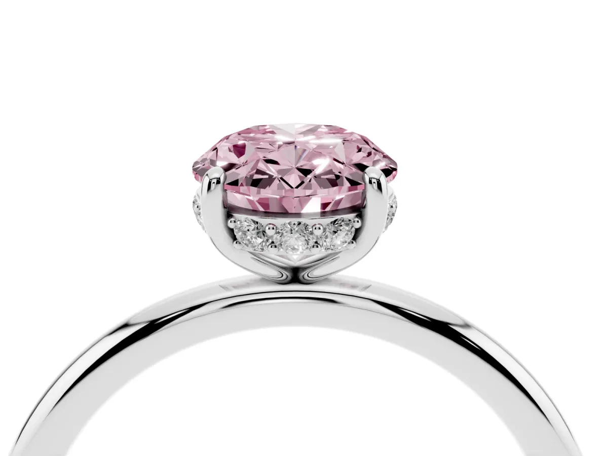 Fancy Pink Oval Cut Solitaire Diamond Ring with a Classic Band and Four-Prong Setting Silver