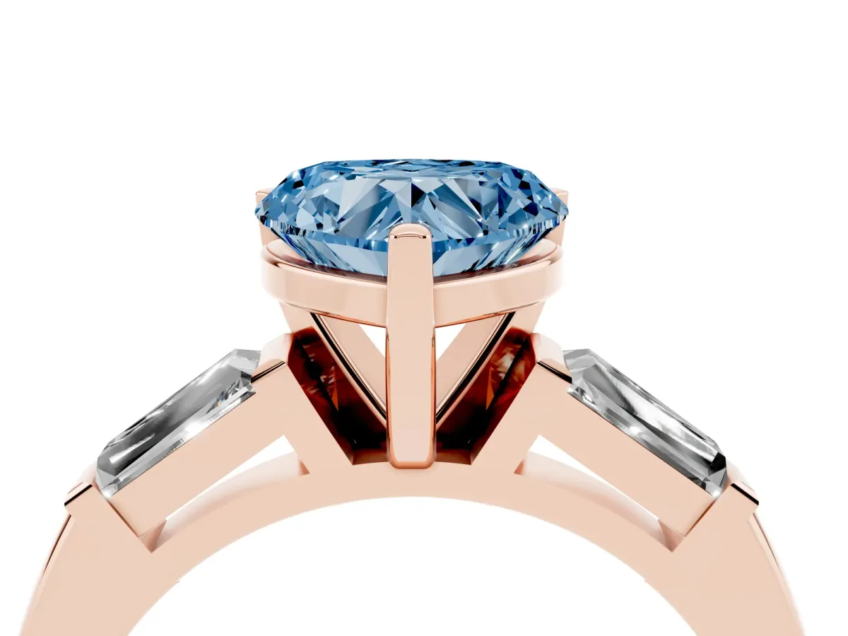 Fancy Blue Heart Cut Solitaire with Tapered Baguette Side Stones on a Classic Band with Four-Prong Setting Rose gold