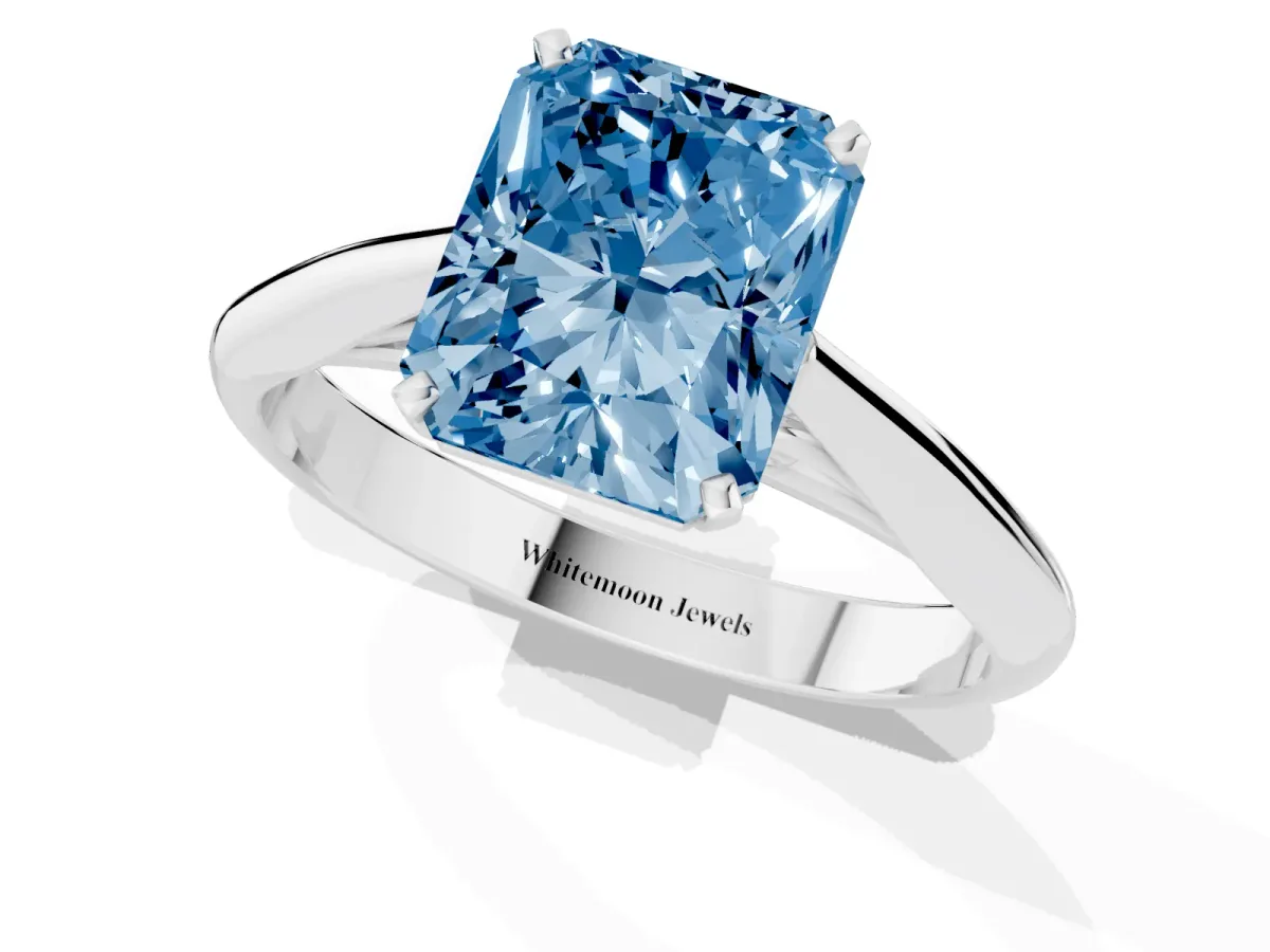 Fancy Blue Radiant Cut Diamond Solitaire Engagement Ring with Cathedral Setting and Four-Prong Mount Silver