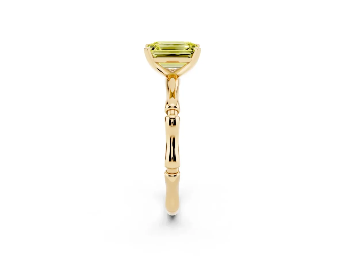 Fancy Yellow Emerald Cut Solitaire Diamond Ring with Bamboo Band and Four-Prong Setting Yellow gold