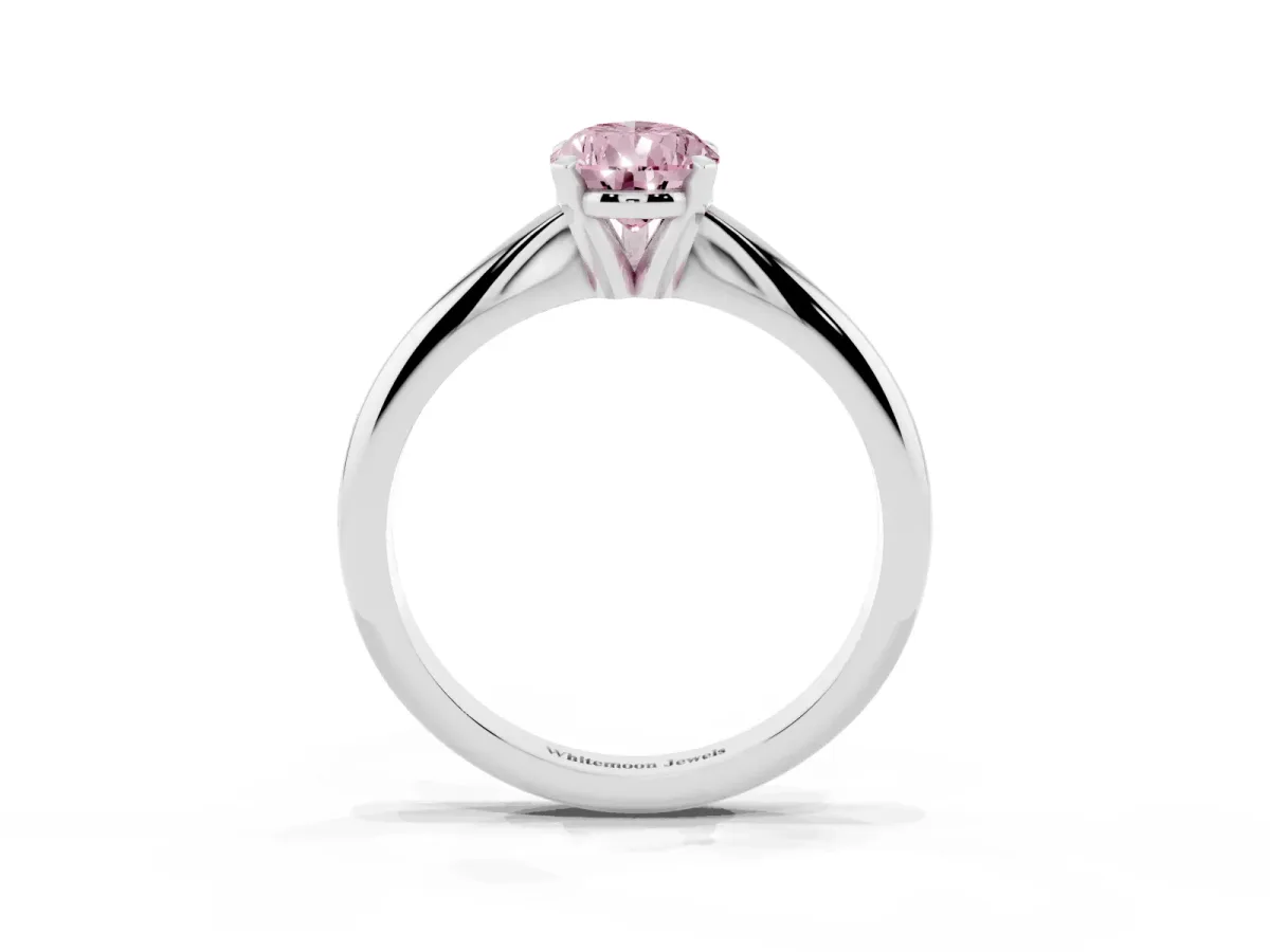 Fancy Pink Pear Cut Cut Solitaire Ring with Four-Prong Setting on a Classic Band Platinum