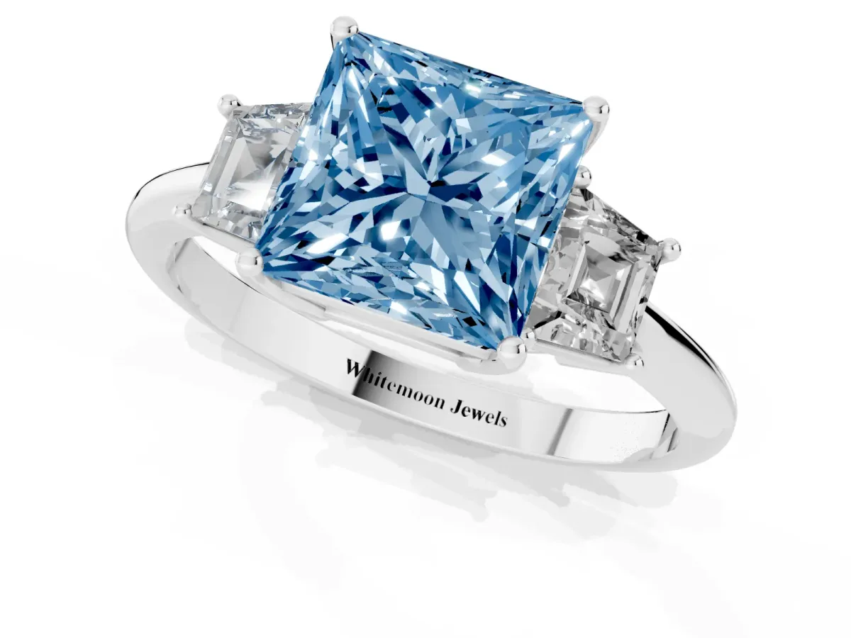 Fancy Blue Princess Cut Diamond Three-Stone Ring with Trapezoid Side Stones and Prong Setting Silver