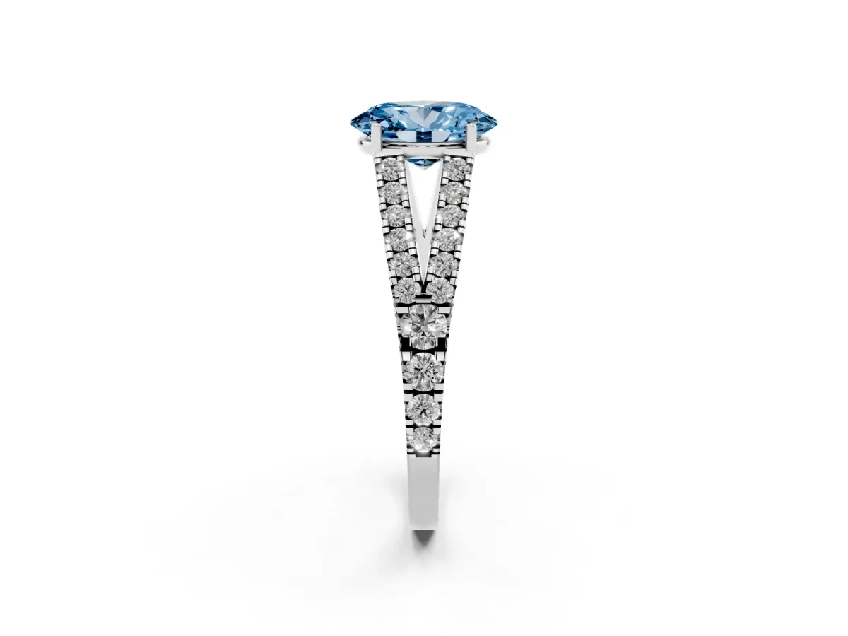 Fancy Blue Oval Cut Diamond Split Shank Pavé Engagement Ring with Four-Prong Setting Silver