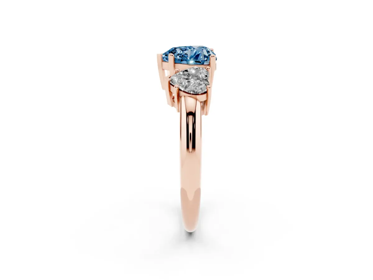 Fancy Blue Three-Stone Heart Cut Cut Diamond Engagement Ring with Prong Setting on a White Gold Band Rose gold